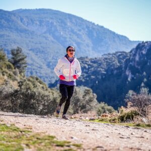 Woman running in the natural beauty of Izmir mountains, Turkey.